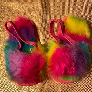New without tags furry slippers/flip flops multi colored . 6-9 months girls